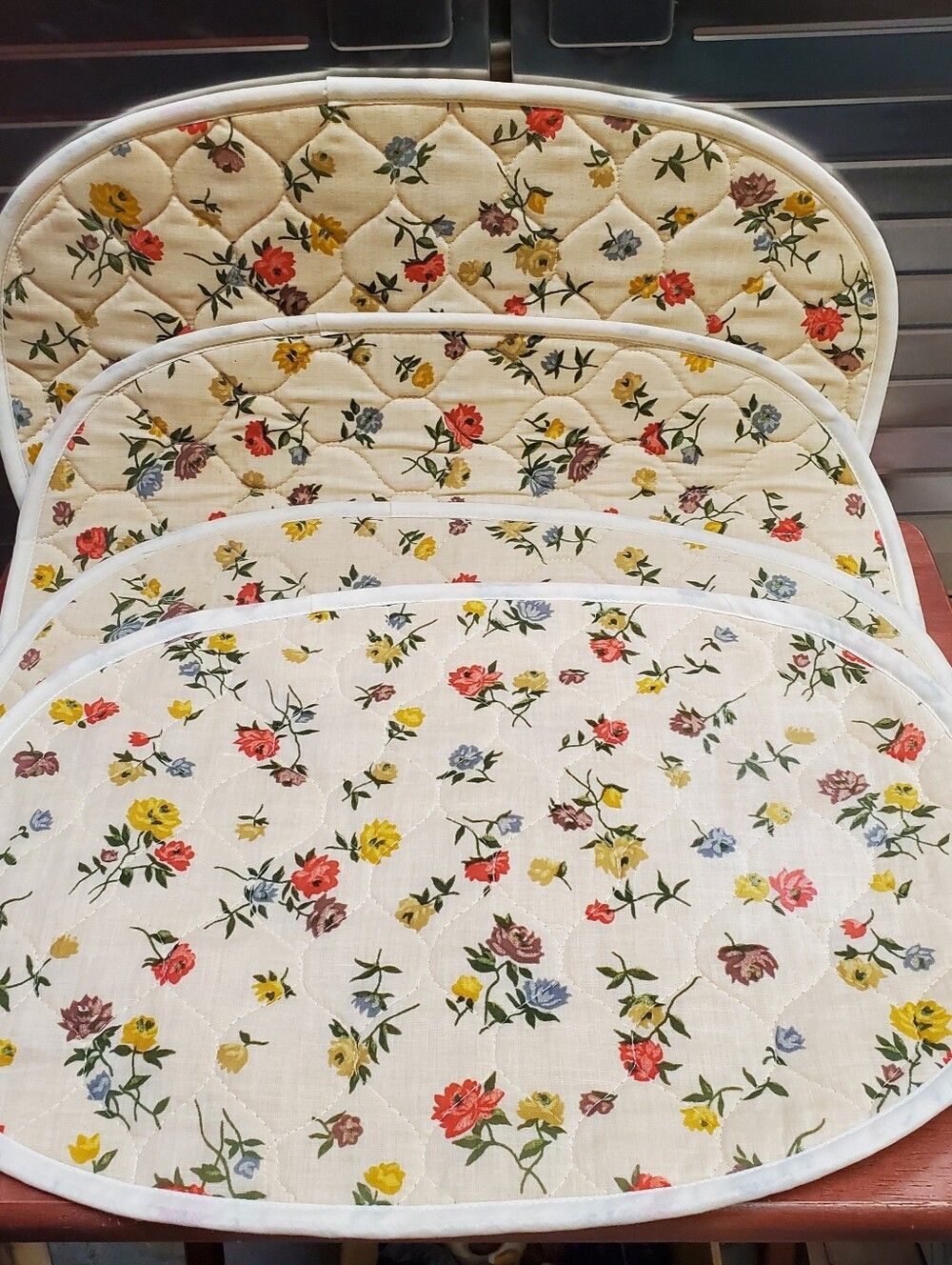 Vintage 4 pc Quilted Floral Oval Cloth Placemat Set